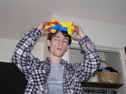 David made a crown of legos.
It's a flexible ring of lego block hinges.