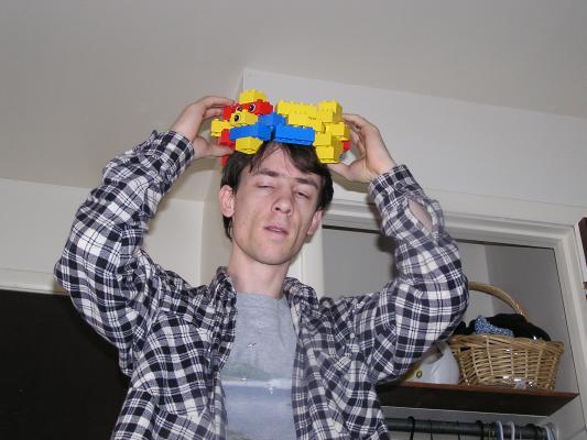 David made a crown of legos.
It's a flexible ring of lego block hinges.