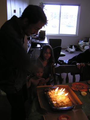 David blows out the candels with his hand.