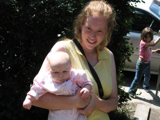 Sarah and Katie by the gate at Grandma's house.