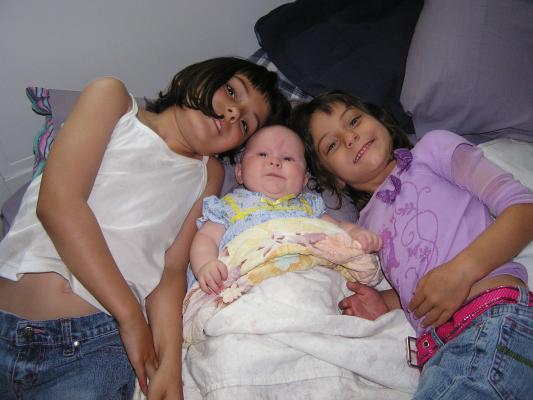 Malia, Sarah and Andrea pose for a photo.