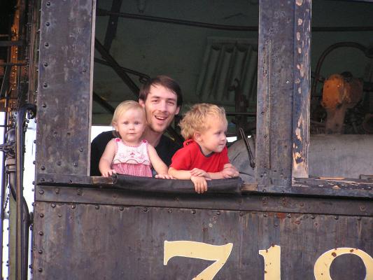 David, Sarah and Noah look out the engine's window