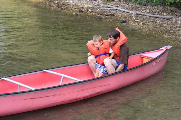 David and Joshu in a boat