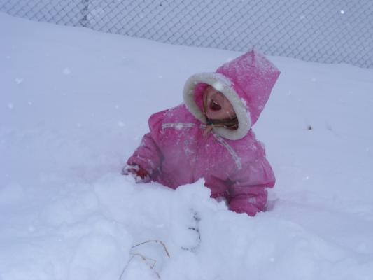Sarah plays in the snow.