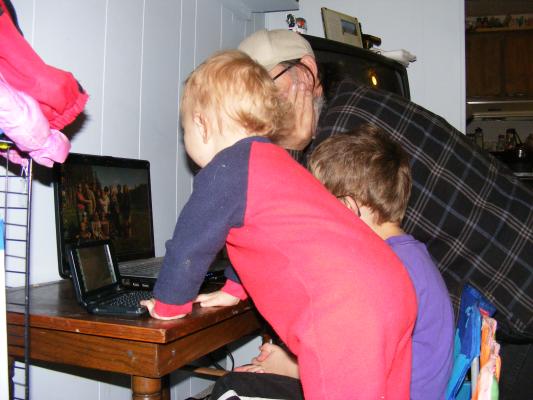 We found a little very old laptop liked thing for Josh to copy them with. 