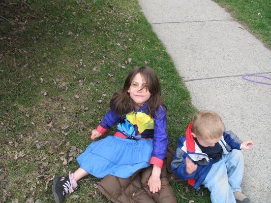 Andrea and Noah play outside.