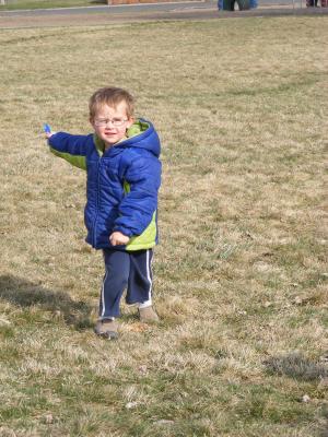 Noah flies a kite.