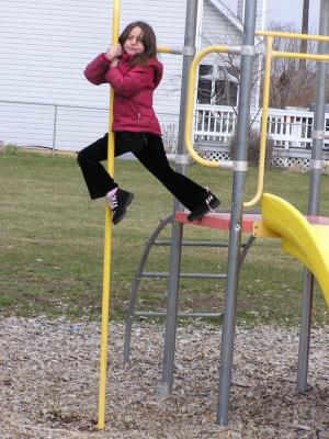 Andrea plays at the park before the Easter Egg hunt.