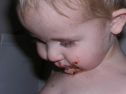 Noah eats birthday cake.
