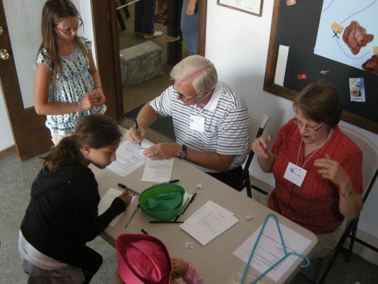 Registering with Mr. Bill and Miss Deb. 
