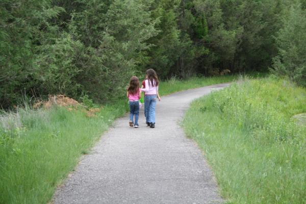 Andrea, Nicole and Malia go down the trail.