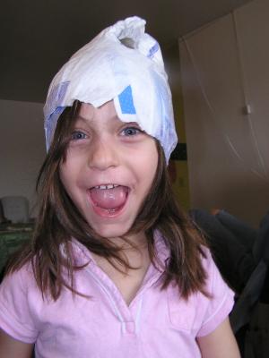 Silly Andrea has a diaper on her head.