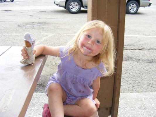 Sarah got purple ice-cream. It matches her dress.