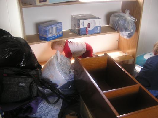 Sarah crawls on a shelf as we move in.