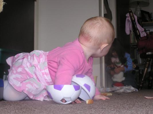 Sarah looks for more toys.