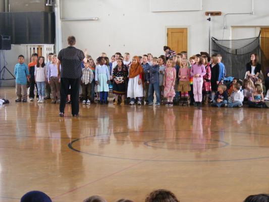 Andrea's first grade class sings for International day.