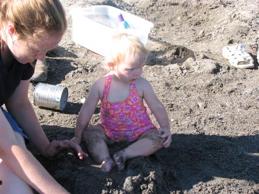 Katie and Sarah play in the sand