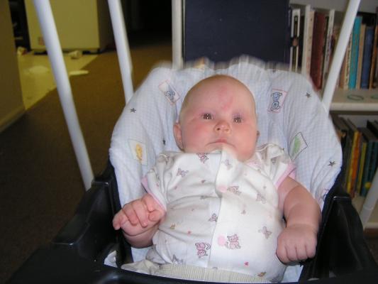 Sarah in her swing.