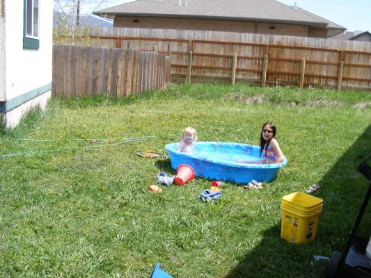 Sarah and Malia in the pool.