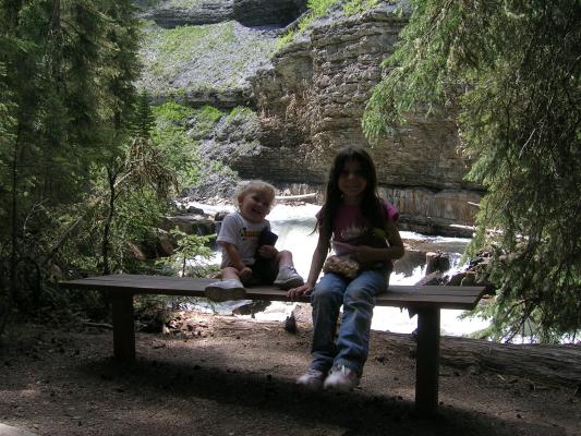 Noah and Andrea take a break on the bench.