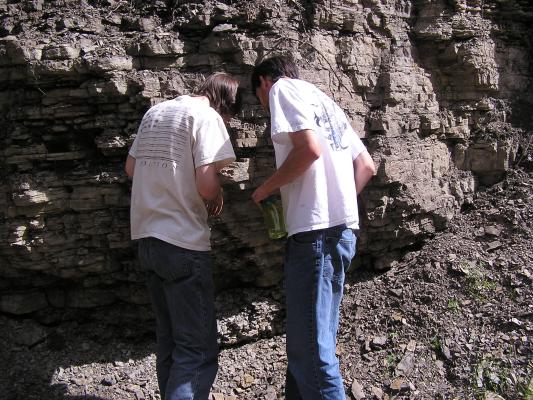David and Myke look for some rocks.