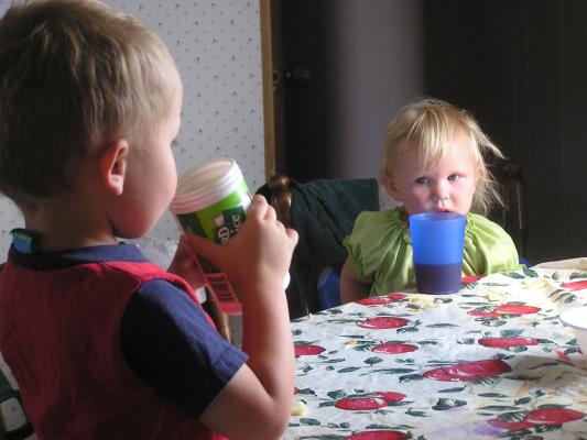 Noah and Sarah are having some juice.