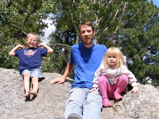 Noah, David and Sarah on rock.