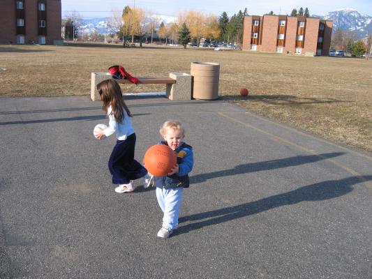 Noah and Andrea playing ball