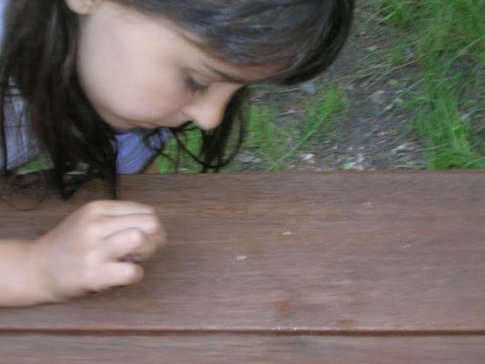 Malia looks for a clue.