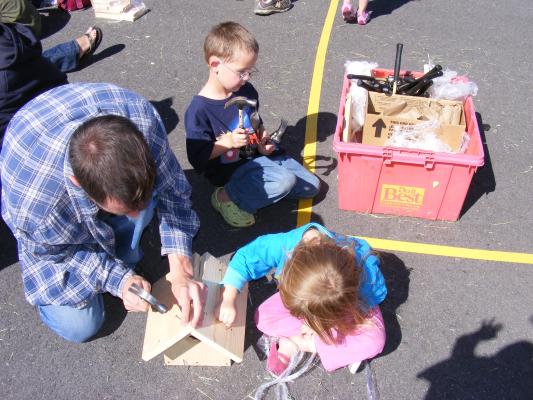 Building a birdhouse at the Hyalite Fall Festival.
