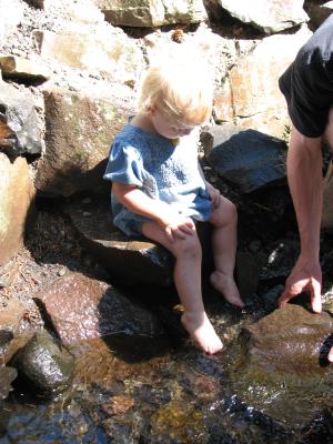 Sarah plays in the cold water