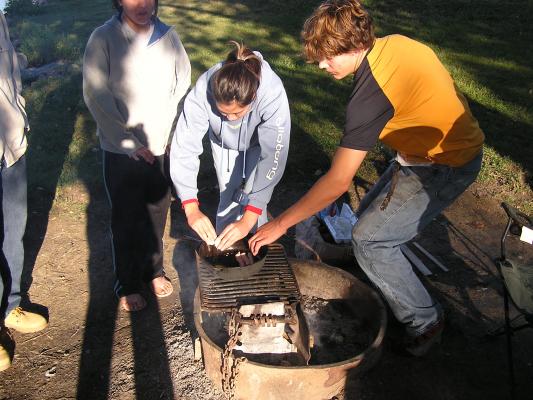 Christian Student Fellowship campout.
Cooking Breakfast.