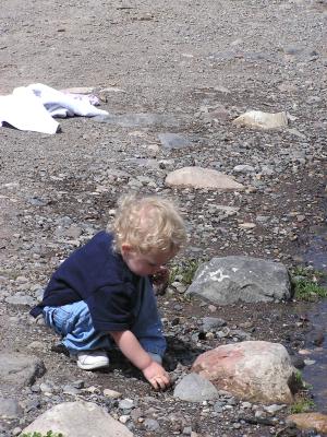 Noah gathers more rocks.