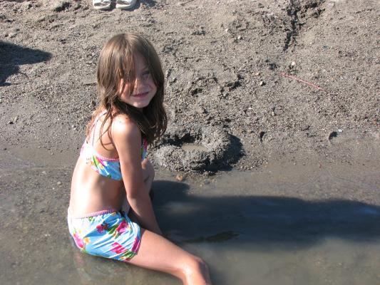 Andrea plays in the sand