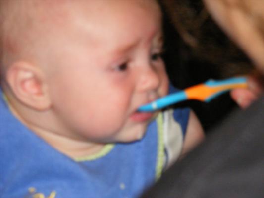 Joshua eats rice cereal