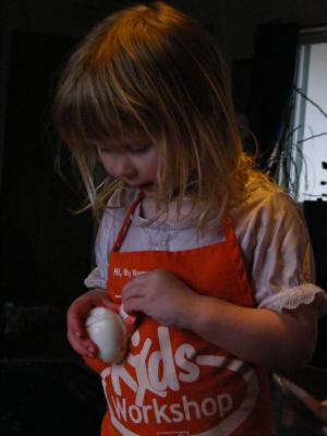 Sarah peels an 
Easter Egg