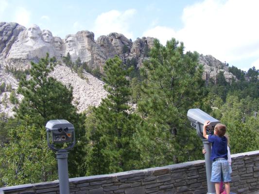Noah plays with binoculars