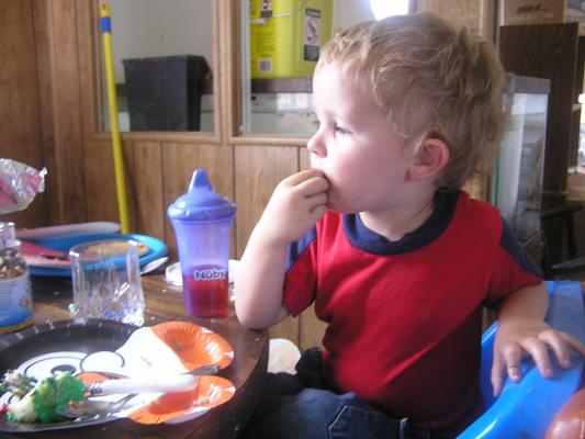 Noah eats his birthday cake