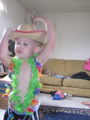 Noah playing dress-up