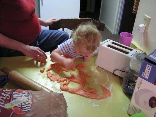 Katie and Noah make Valentines Day sugar cookies.