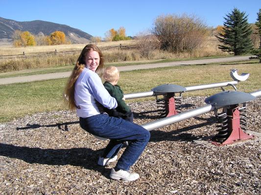 Katie and Noah on a teter totter.