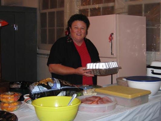 Kim Shaw (Bea's Cousin, Kenny's wife) 
preparing for Charis's wedding reception