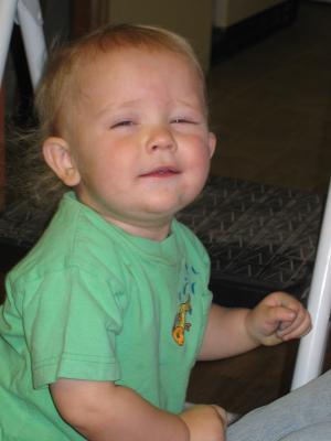 Noah makes a face for his Grandma's camera.