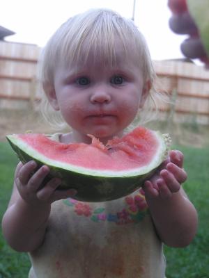 Sarah eats some watermelon.