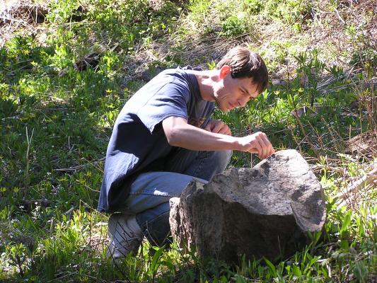 David plays with a bigger rock