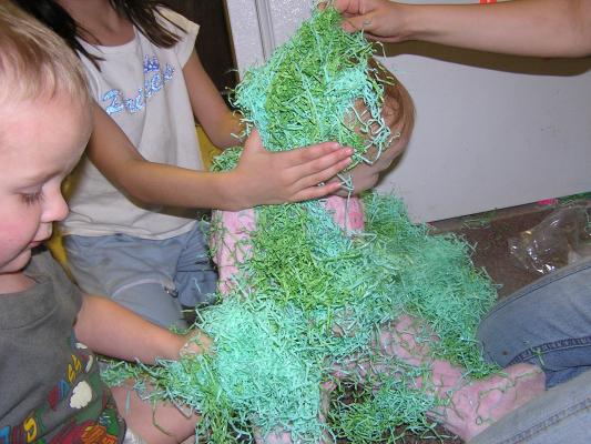 Let's cover Sarah with Easter grass.