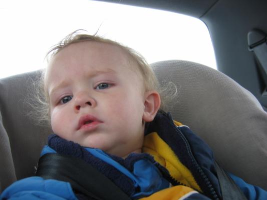 Noah in his car seat on the way to Church.