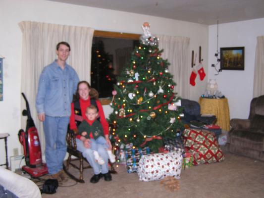 The Eder family in front of the Christmas tree.