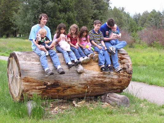 David, Noah, Malia, Sarah, Nicole, Andrea, Michael, Robert, and Steven on the big log.