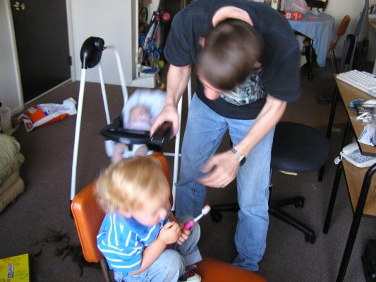 Noah gets a hair cut.